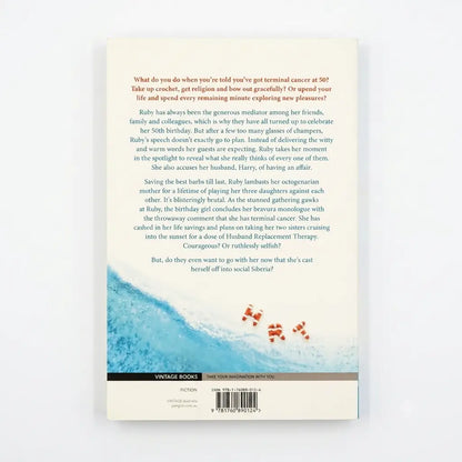 The back cover of a vintage book titled 'The Art of Crochet' by Ruby, featuring a light blue and white textured crochet pattern on the left, a white title block with black text in the center, and a barcode at the bottom right.