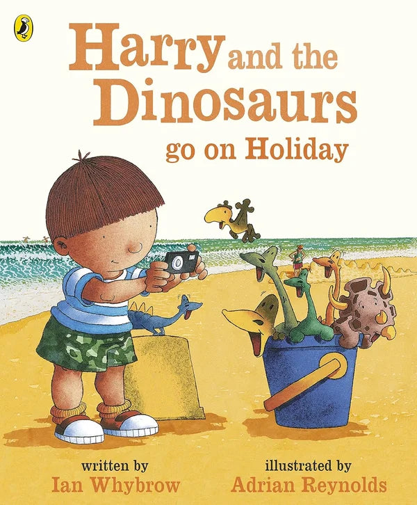 Book cover of 'Harry and the Dinosaurs go on Holiday' with a boy and dinosaurs on a beach.