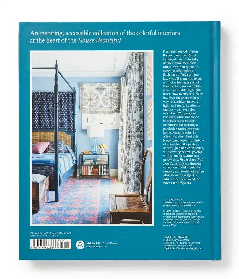 The back cover of the book 'An Inspiring, Accessible Collection of the Colorful Interiors at the Heart of the House Beautiful' by Alison. The cover features a prominent teal-blue border with white text and a central color photograph of a bedroom interior with blue walls, patterned curtains, and a bed.