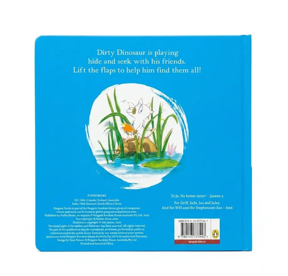 The back cover of a children's book titled 'Dirty Dinosaur' showing a bright blue background with white text, a central illustration of a white cat in tall green grass by a pond, and a small barcode at the bottom right.