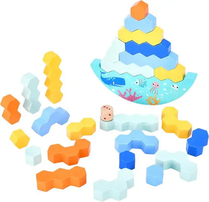 Colorful geometric shape building blocks with a whale-themed base on a white background