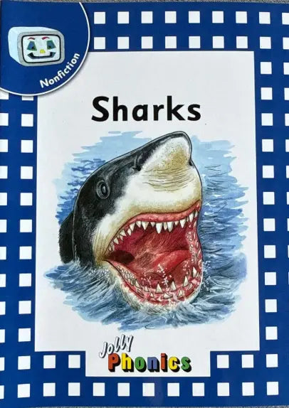 Book cover of 'Sharks' from John Phonics with a shark illustration on a blue and white checkered background.