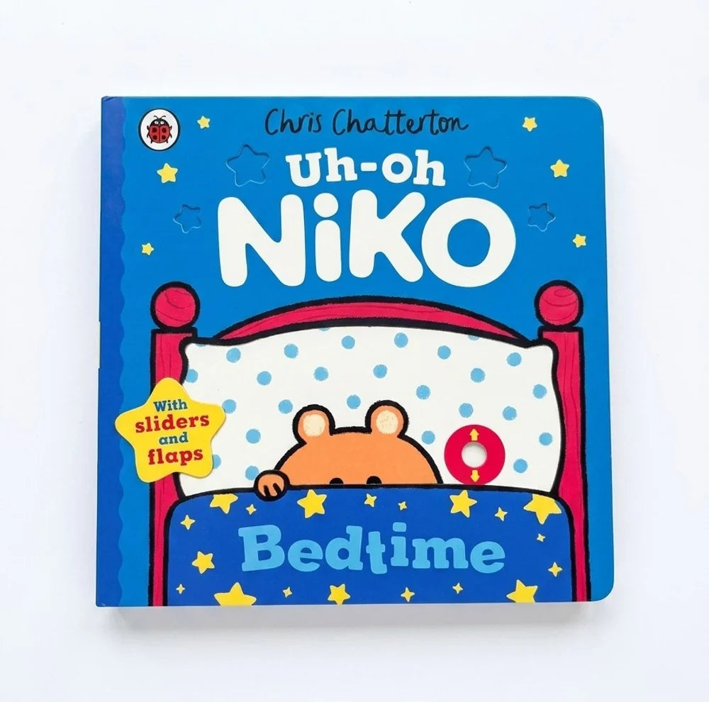 Children's book titled 'Uh-oh Niko Bedtime' with a cartoon bear character on a blue cover.