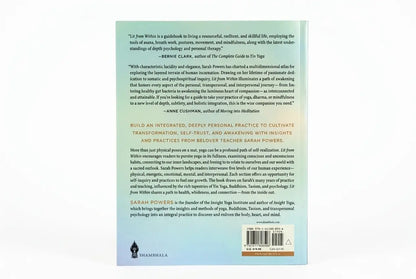 Back cover of a book with text and a barcode on a light blue background