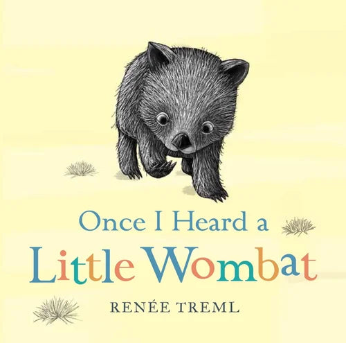 Book cover of 'Once I Heard a Little Wombat' with a illustration of a wombat on a yellow background.