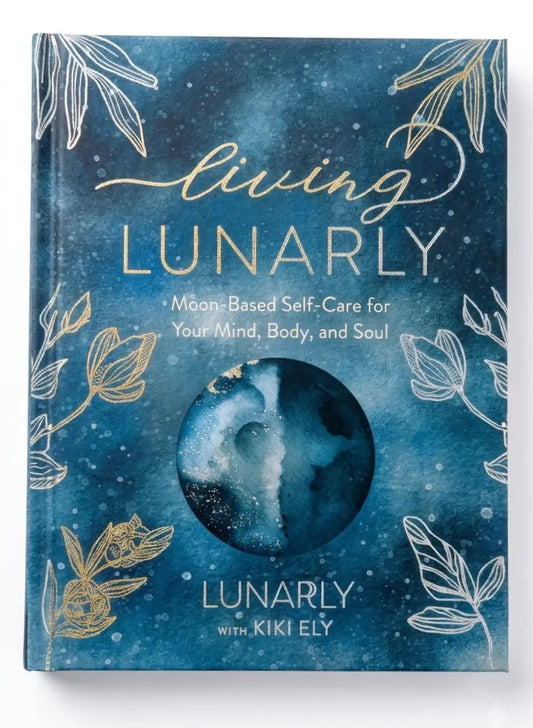 Book titled 'Living Lunarily' with celestial design on a white background