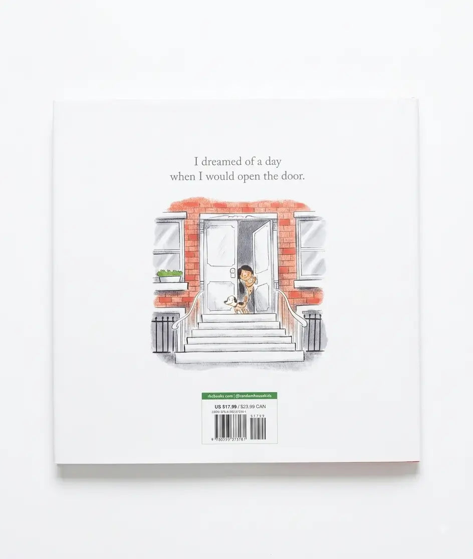The back cover of a children's book titled 'I dreamed of a day when I would open the door.' shown against a clean white background.