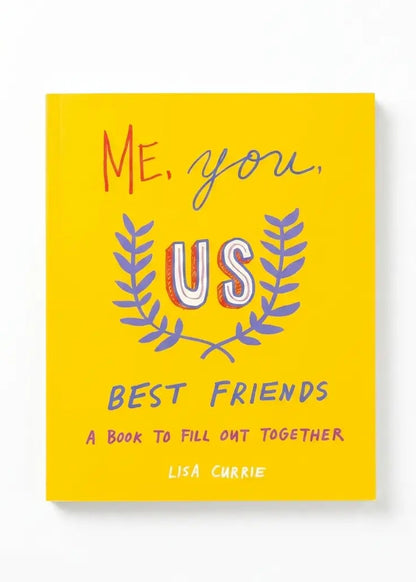 The front cover of the book 'Me, You, Us: A Book to Fill Out Together' by Lisa Currie, featuring a bright yellow background with colorful hand-drawn text and a laurel wreath graphic.