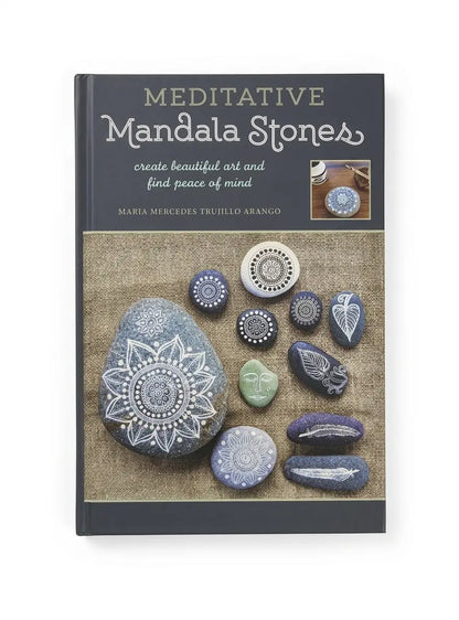 The book 'Meditative Mandala Stones' by Maria Mercedes Trujillo Arango, featuring a dark gray cover with a textured beige lower section displaying various decorated stones.