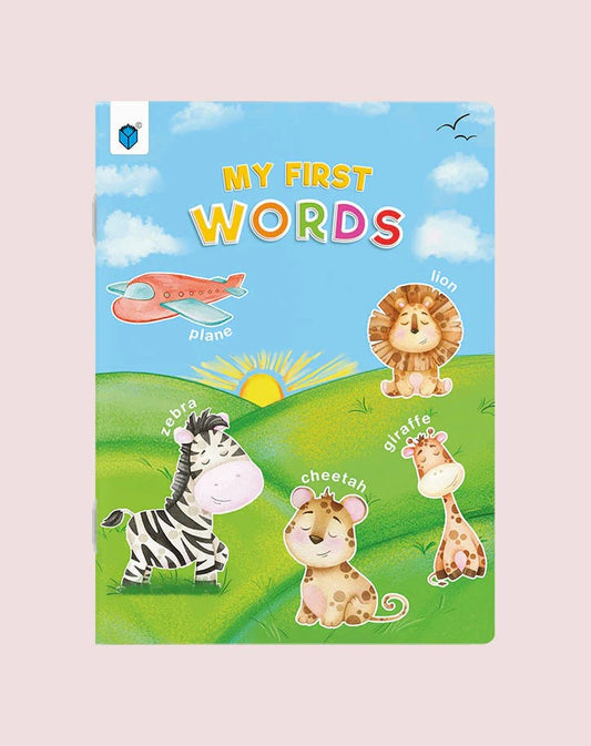 Children's book titled 'My First Words' with animal illustrations on a blue sky and green field background.
