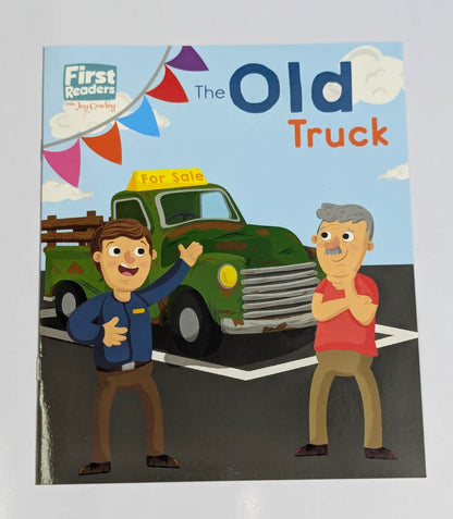 Book cover of 'The Old Truck' with two characters and a green truck on a blue background