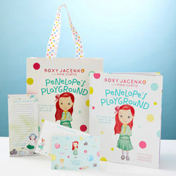 Children's book titled 'Penelope's Playground' by Roxy Jacenko with a matching tote bag on a light blue background.
