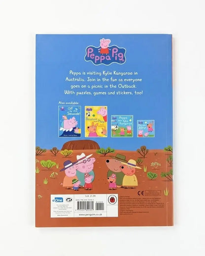 The back cover of a Peppa Pig children's book, featuring a blue sky background, cartoon characters in an Outback scene, and product details including a barcode and age suitability text.