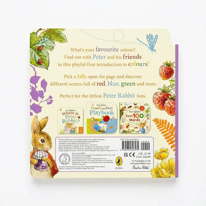 Back cover of a children's book or playbook package, featuring illustrated Peter Rabbit, strawberries, flowers, and text inviting children to pick a tab and discover colors. Visible branding includes Penguin and British Board of Inclusion.
