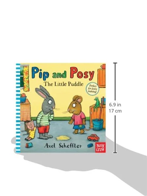 Children's book titled 'Pip and Posy: The Little Puddle' held in a hand with dimensions displayed.
