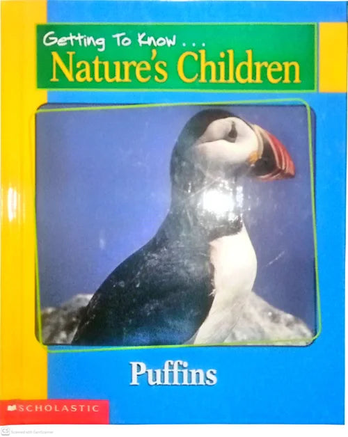 Book cover of 'Getting To Know Nature's Children: Puffins' with a puffin illustration on a blue background.