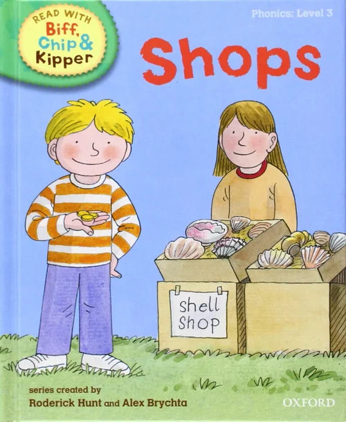 Book cover of 'Shops' from the Biff, Chip & Kipper series with two children and a shell shop.