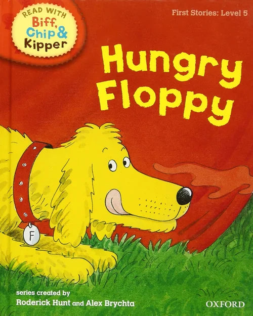 Book cover of 'Hungry Floppy' from the Biff, Chip & Kipper series with a yellow dog on a red background.