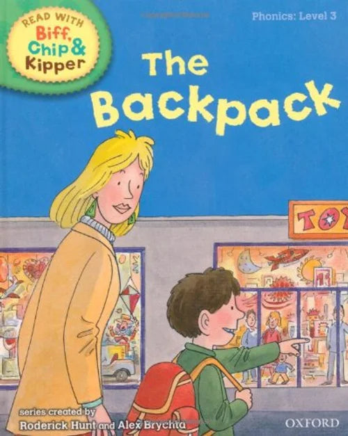 Book cover of 'The Backpack' from the Biff, Chip & Kipper series with a woman and child in a toy store.