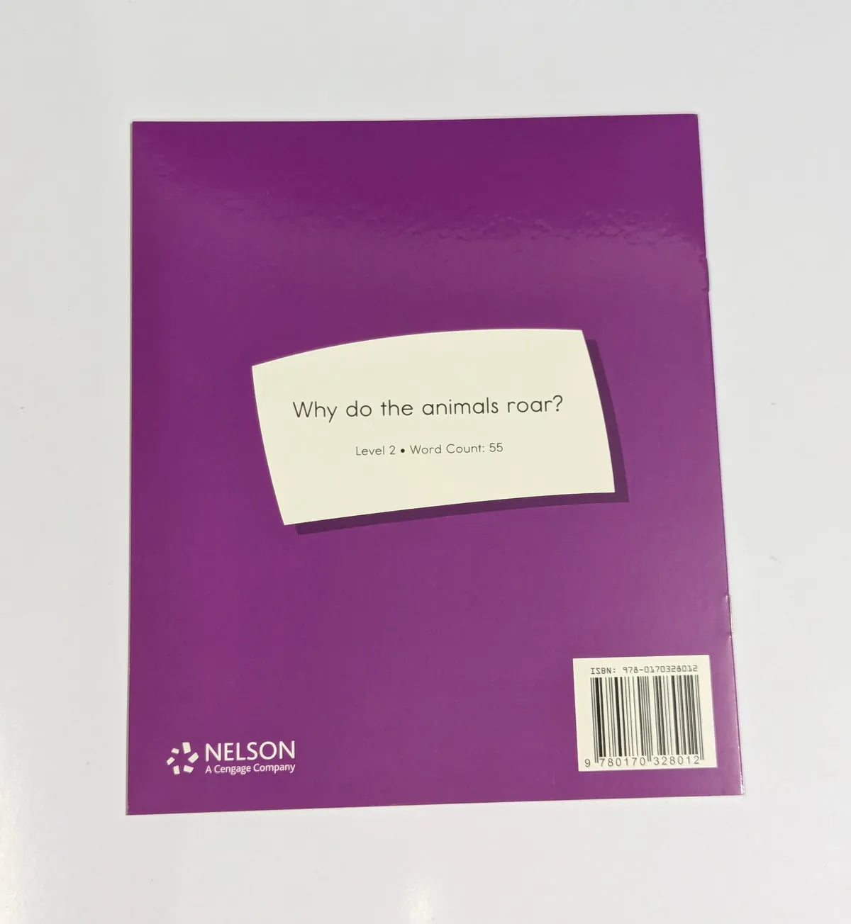 Purple book cover with a white label and Nelson logo on a light gray background