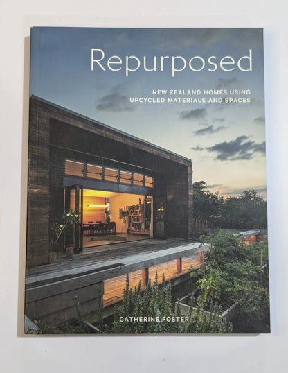 Book cover of 'Repurposed' featuring a modern house with upcycled materials.