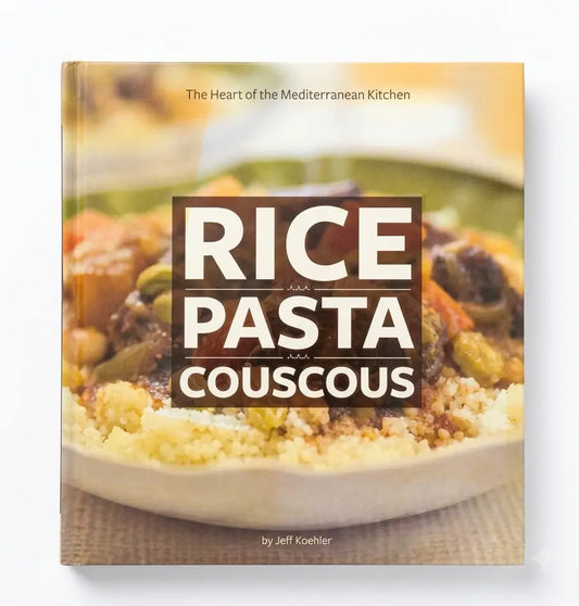 A hardcover cookbook titled 'Rice Pasta Couscous' by Jeff Koehler, featuring a close-up food photograph on the cover and a white background.