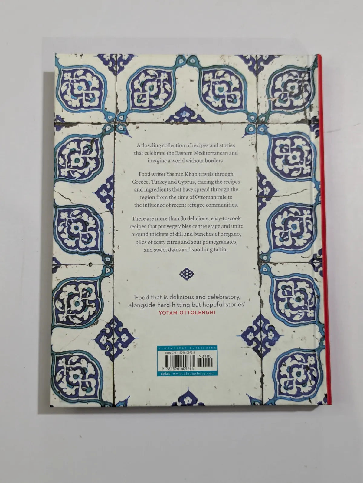 Book cover with blue and white geometric pattern on a gray background