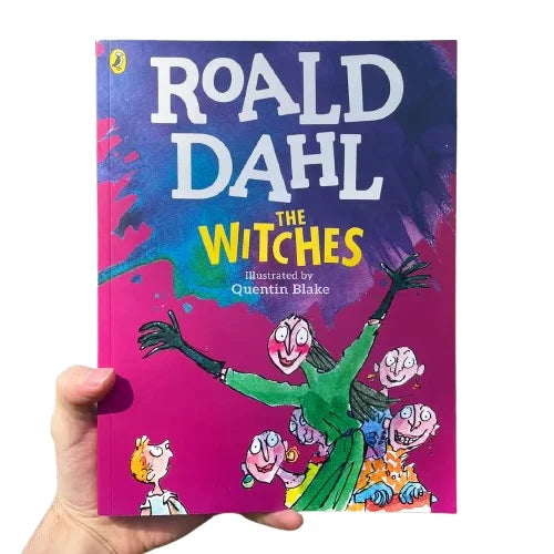 Book titled 'The Witches' by Roald Dahl with colorful cover and hand holding the book.
