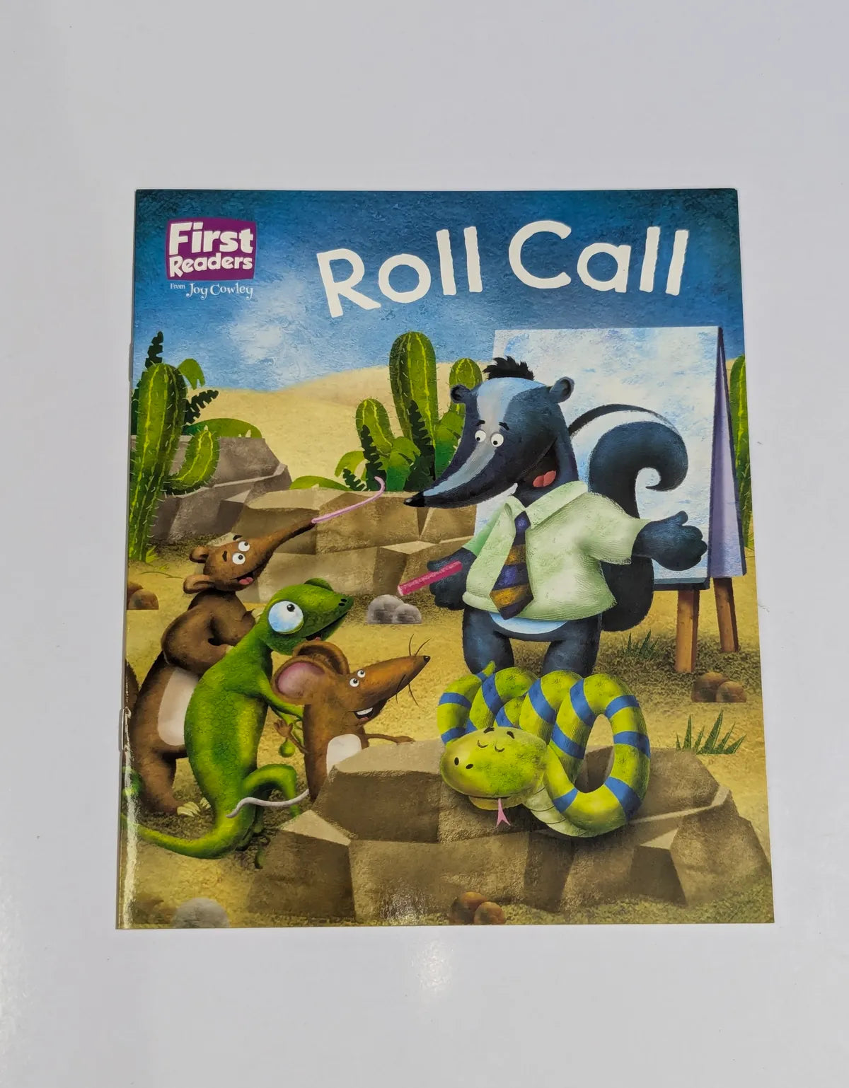 Book cover of 'Roll Call' featuring cartoon animals in a desert setting.