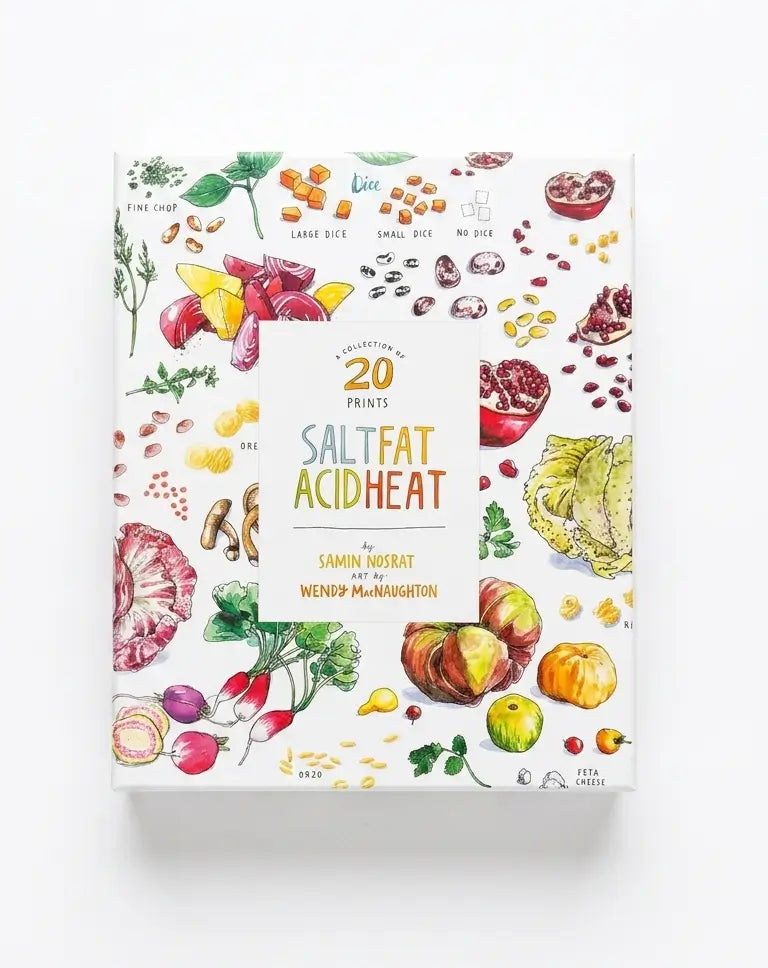 A boxed book or booklet titled "Salt Fat Acid Heat" by Samin Nosrat and Wendy McNaughton, shown on a clean white background. The front cover features colorful watercolor illustrations of foods and ingredients, including vegetables, grains, seeds, and spices, surrounding a central title panel.