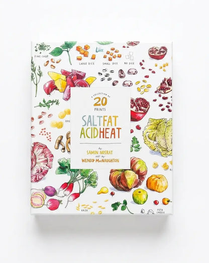 A boxed book or booklet titled "Salt Fat Acid Heat" by Samin Nosrat and Wendy McNaughton, shown on a clean white background. The front cover features colorful watercolor illustrations of foods and ingredients, including vegetables, grains, seeds, and spices, surrounding a central title panel.