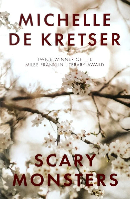 Book cover of 'Scary Monsters' by Michelle de Kretser with cherry blossoms in the background.