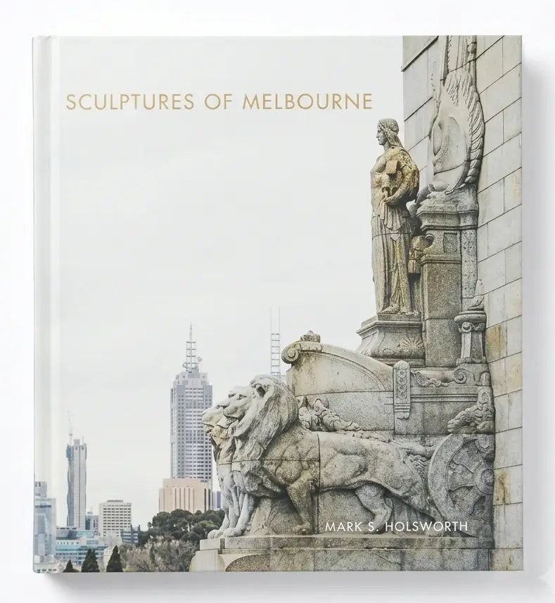 A hardcover book titled 'SCULPTURES OF MELBOURNE' by Mark S. Holsworth, featuring a cover photograph of stone lion and statue sculptures in Melbourne against a pale sky.