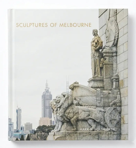 A hardcover book titled 'SCULPTURES OF MELBOURNE' by Mark S. Holsworth, featuring a cover photograph of stone lion and statue sculptures in Melbourne against a pale sky.