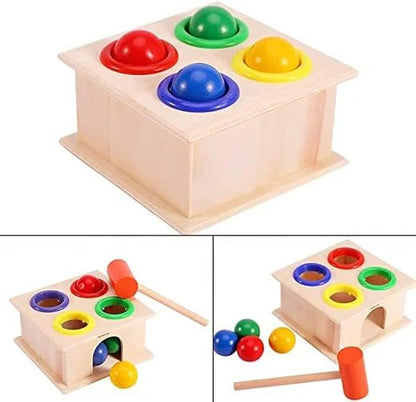 Wooden shape sorting toy with colorful beads and a hammer on a white background