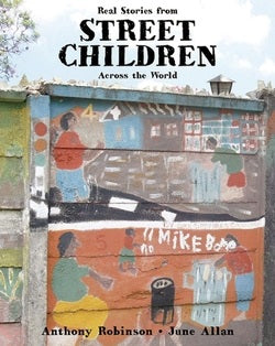 Book cover of 'Real Stories from Street Children Across the World' with a mural on a wall.