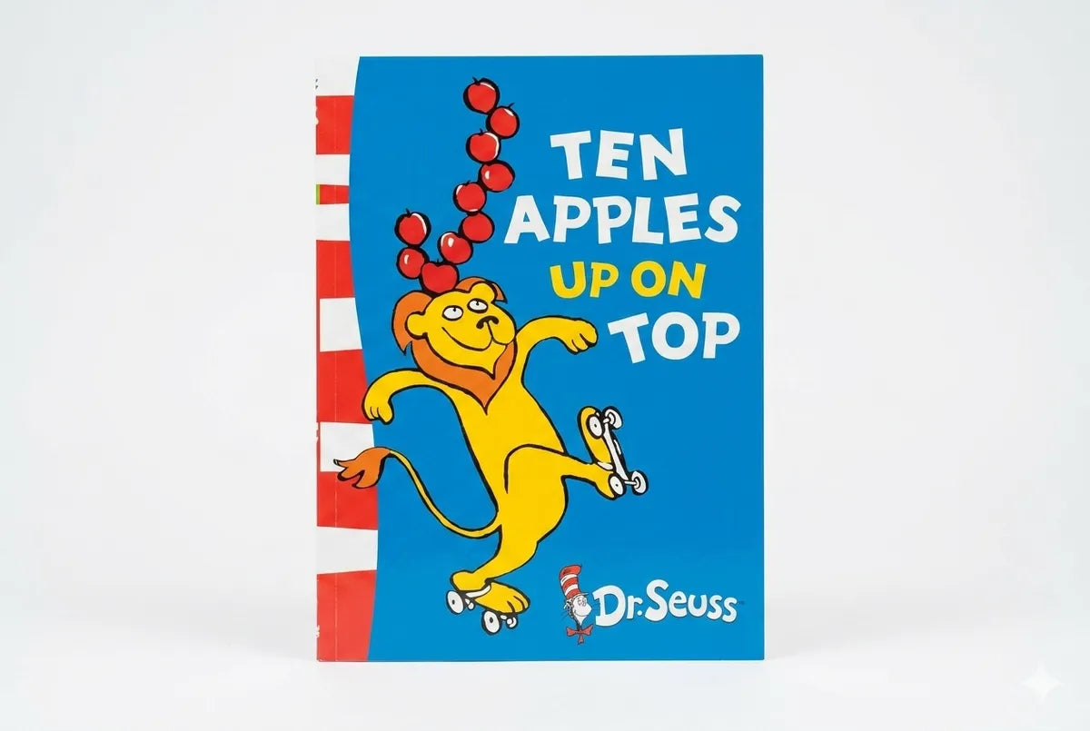 Book cover of 'Ten Apples Up on Top' by Dr. Seuss with a lion character on a blue background.