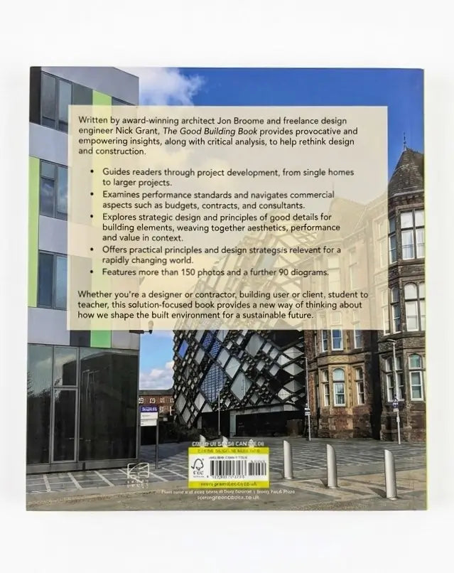 The back cover of the book 'The Good Building Book' by Jon Bromie and Nick Grant, featuring a white text block over a photograph of modern and historic buildings.