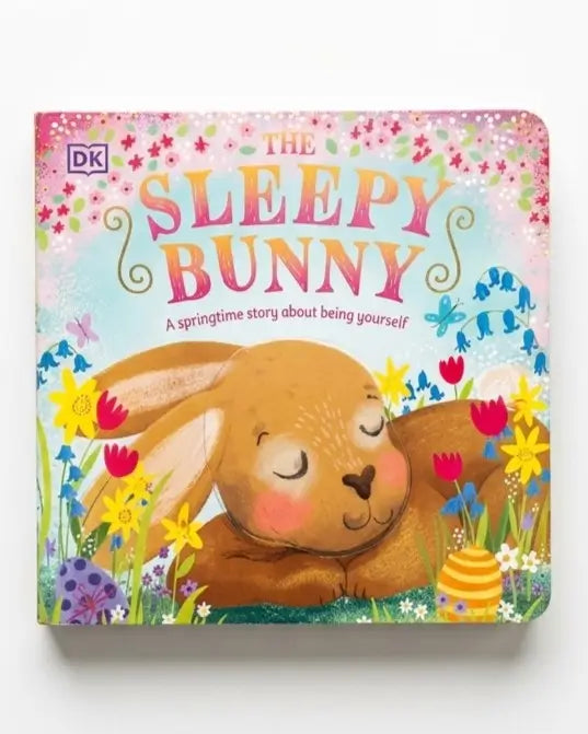The Sleepy Bunny board book by DK, featuring a colorful illustration of a sleeping bunny in a flower field on a white background.