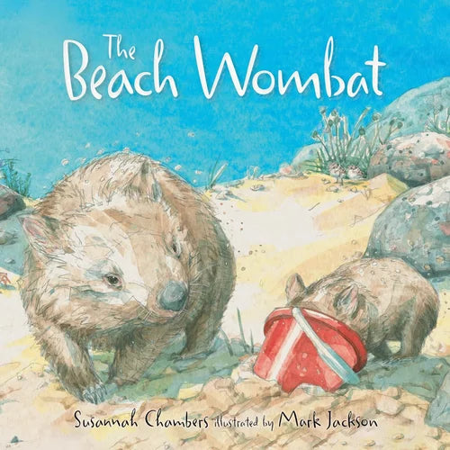 Book cover of 'The Beach Wombat' with illustrations of wombats on a beach.