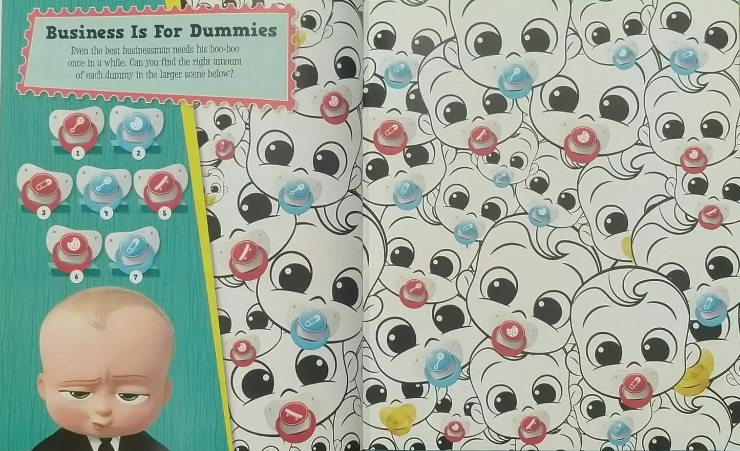 Book with a baby pacifier illustration on the cover and a patterned page with cartoon faces.
