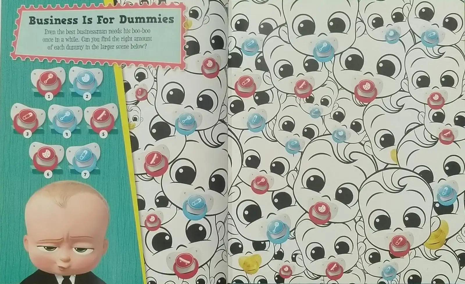 Book with a baby pacifier illustration on the cover and a patterned page with cartoon faces.