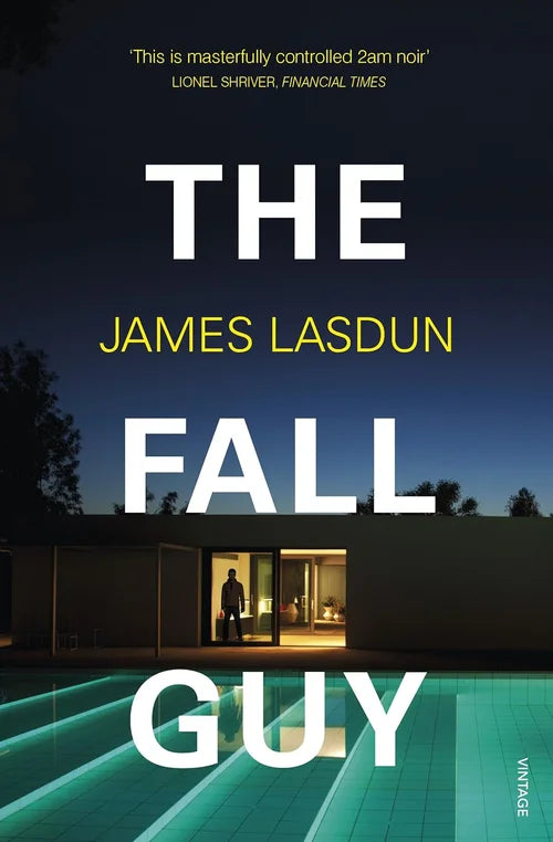 Book cover of 'The Fall Guy' by James Lasdun with a modern house and pool at night.