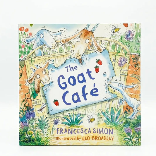 Book cover of 'The Goat Café' with goats and a sign on a colorful background