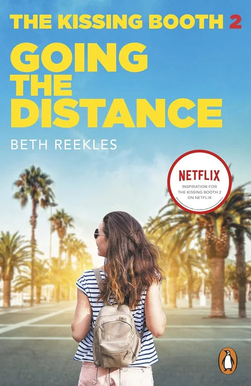 Book cover of 'Going the Distance' from 'The Kissing Booth 2' with a palm tree-lined street and Netflix logo.