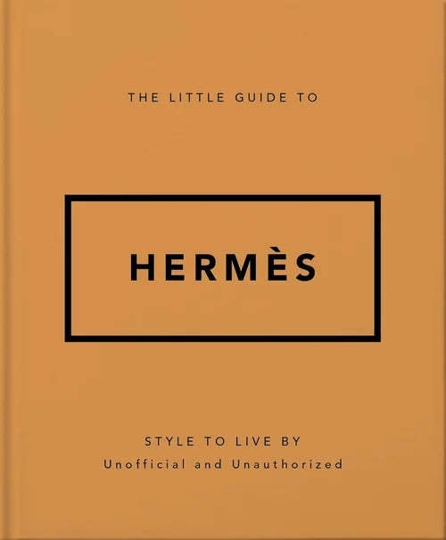 Book titled 'The Little Guide to Hermès' on a brown background
