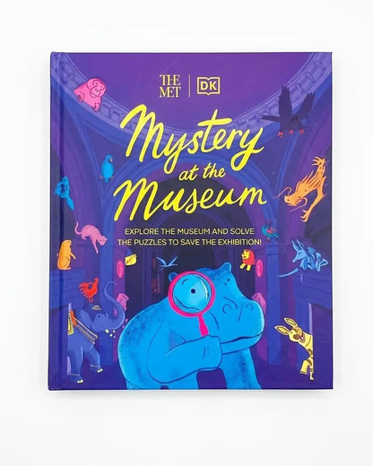 The Met x DK 'Mystery at the Museum' book cover, featuring a purple and blue illustrated design with a blue hippo and colorful animal illustrations, shown on a white background.