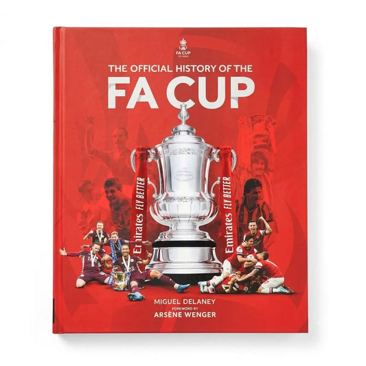 The Official History of the FA Cup book cover, featuring a bold red background with a large silver trophy in the center, player photos, and white title text.