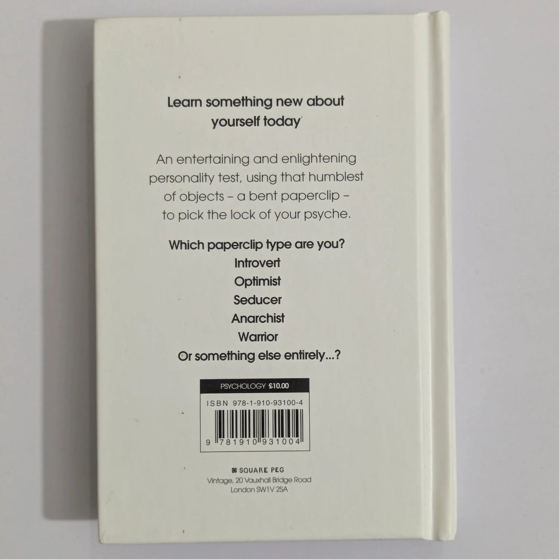 The back cover of a paperback book titled 'Paperclip' by W. Squire, featuring black text on an off-white background with a barcode at the bottom.
