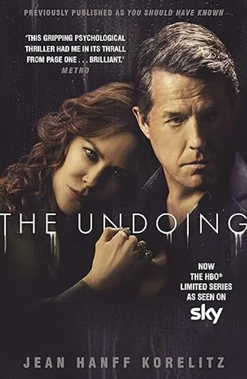 Book cover of 'The Undoing' with a couple holding hands against a dark background.